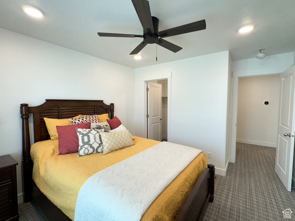 Bedroom featuring carpet flooring, baseboards, recessed lighting, and a ceiling fan
