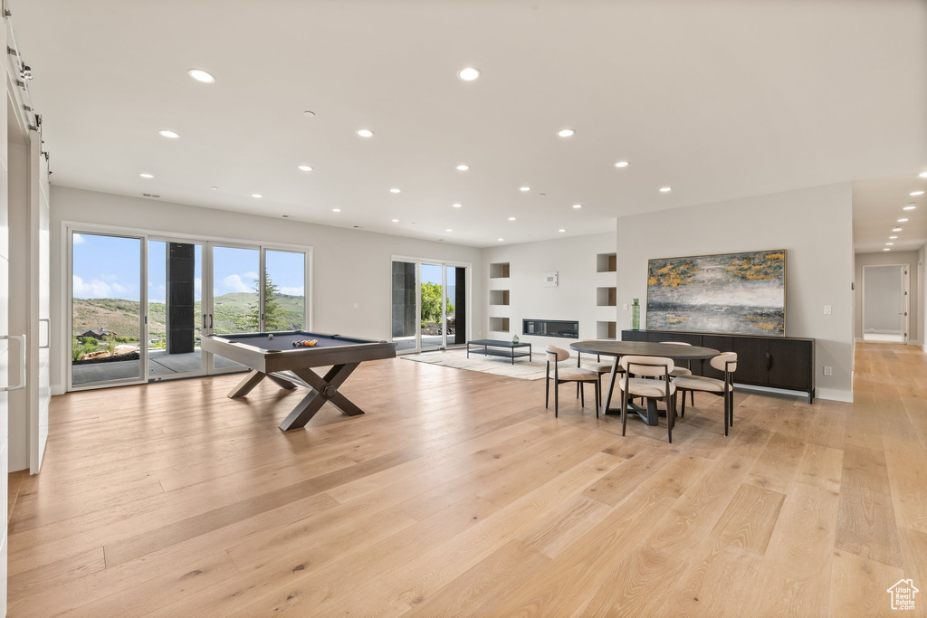 Rec room featuring recessed lighting, billiards, and light wood-type flooring