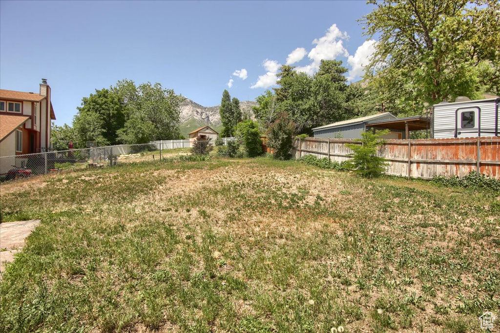 View of yard with a mountain view