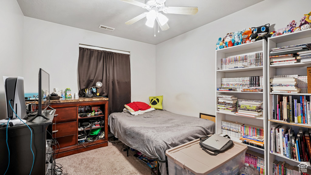 Bedroom featuring carpet flooring and ceiling fan
