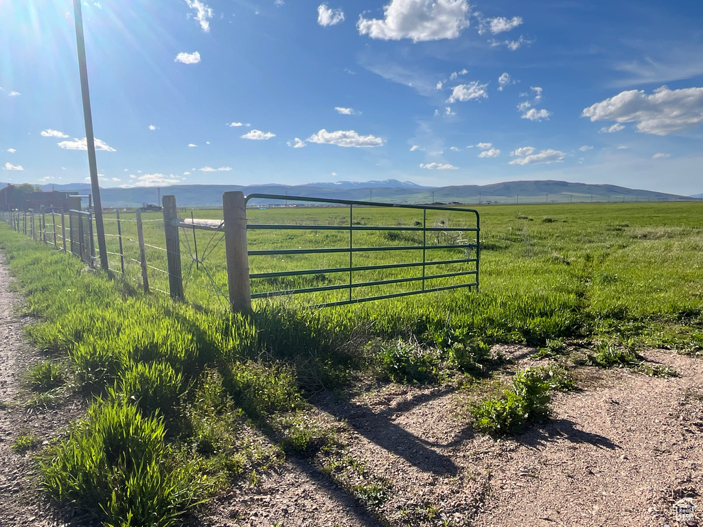 Gate with a view of countryside and a mountain view