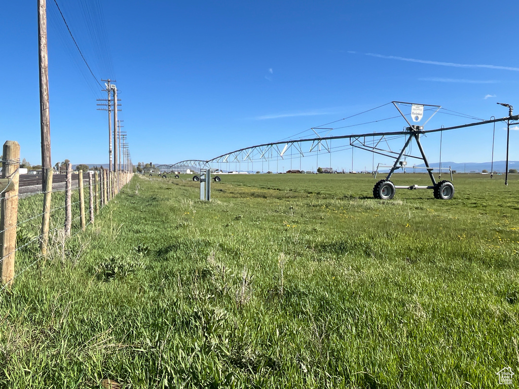 View of yard with a rural view