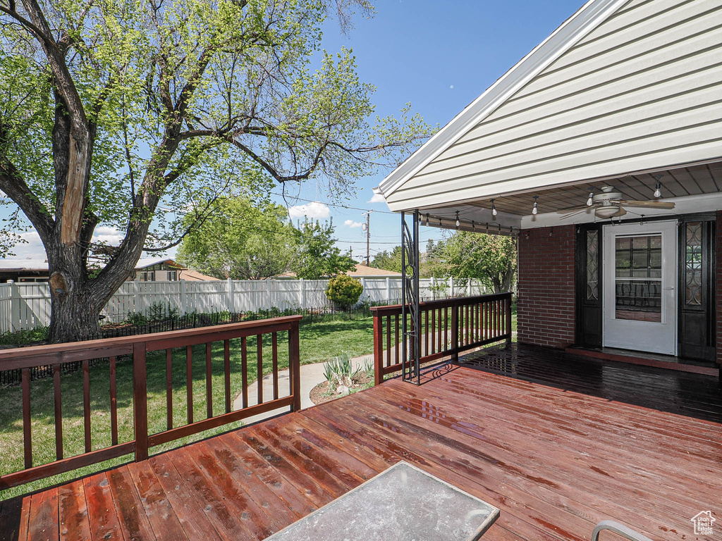 Wooden terrace with ceiling fan