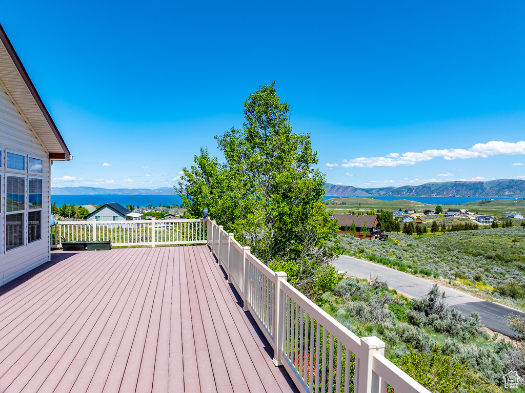 Wooden deck featuring a mountain view