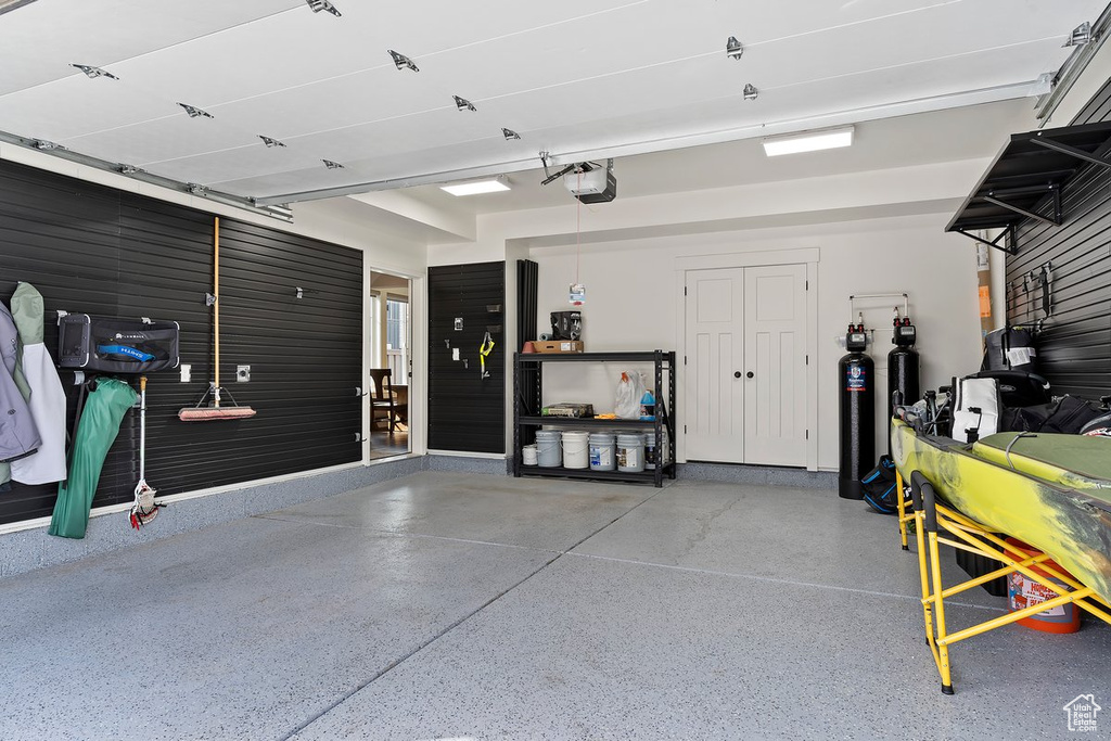 Garage featuring a garage door opener