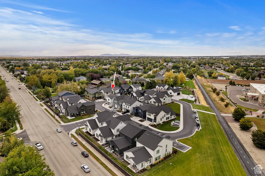 Aerial view of residential area featuring mountains
