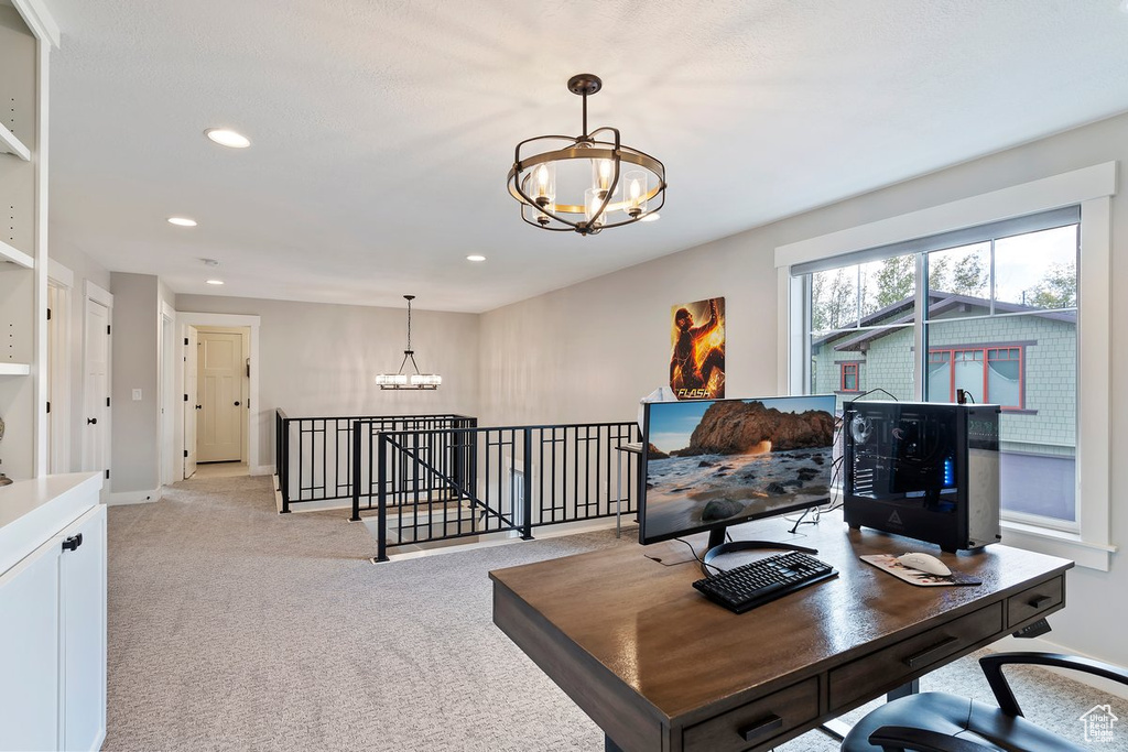 Home office with a chandelier, light carpet, recessed lighting, and baseboards