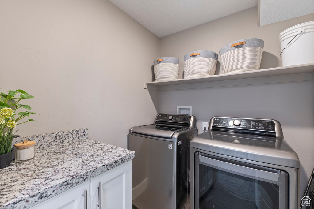 Laundry room featuring washer and dryer