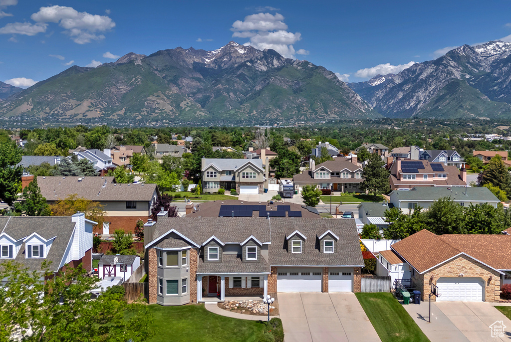 View of mountain background featuring nearby suburban area