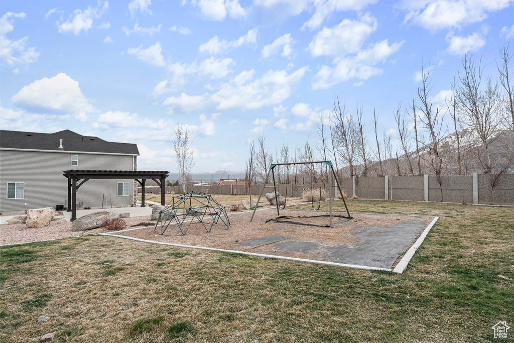 View of play area featuring a pergola