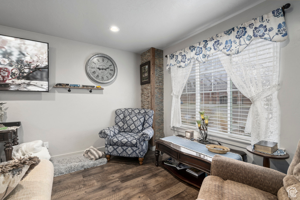 Sitting room featuring wood finished floors, baseboards, and recessed lighting