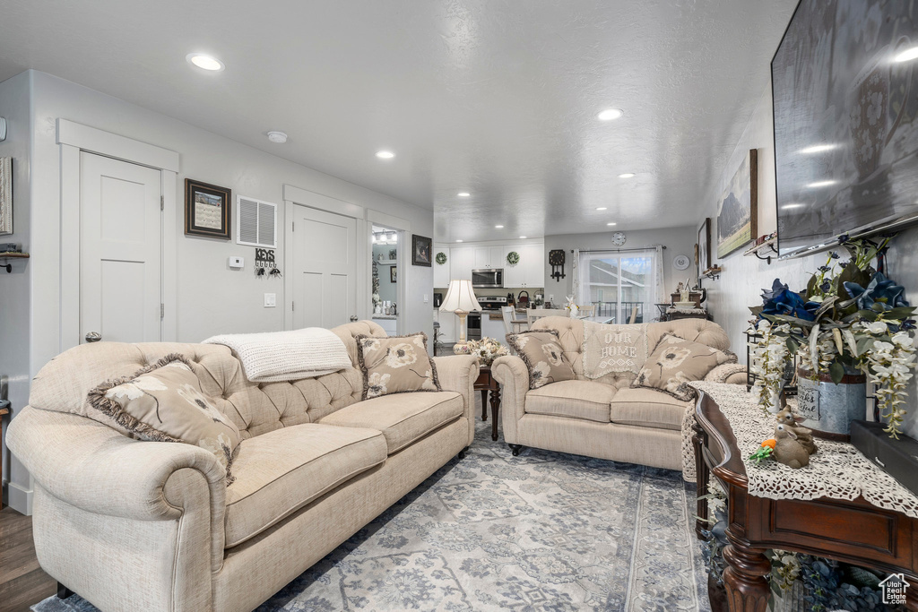 Living room featuring recessed lighting and wood finished floors