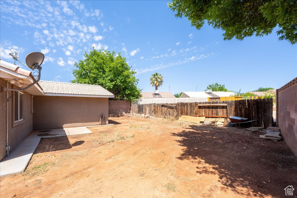 View of fenced backyard