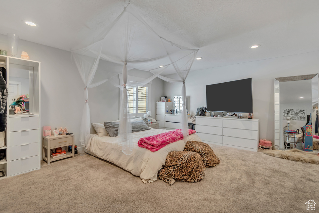 Bedroom featuring carpet and recessed lighting
