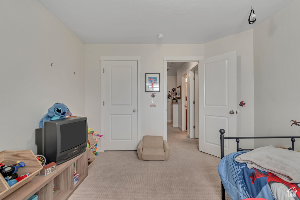 Bedroom featuring carpet floors