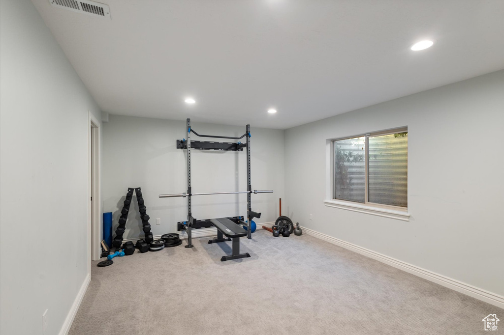 Exercise room featuring recessed lighting, carpet, and baseboards