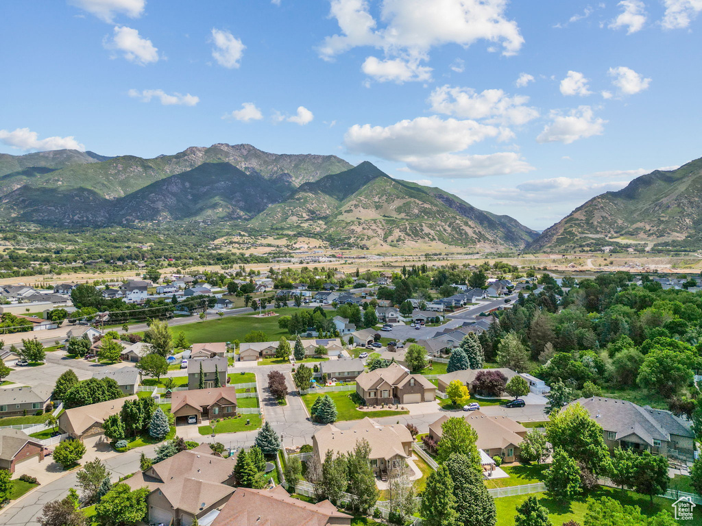 View of mountain backdrop with nearby suburban area