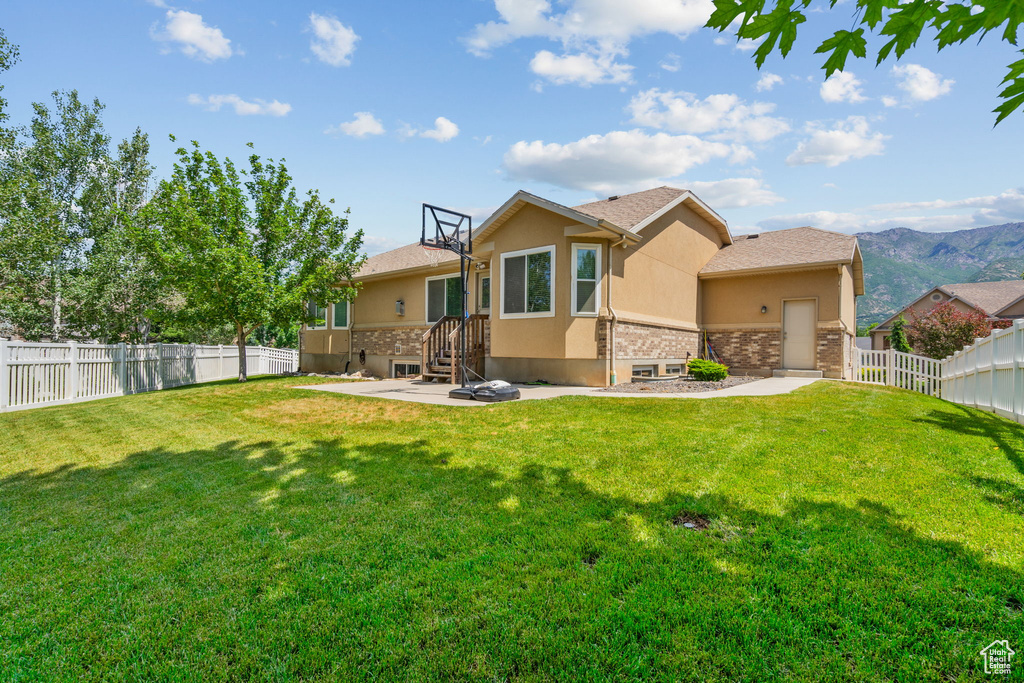 Back of property with stucco siding