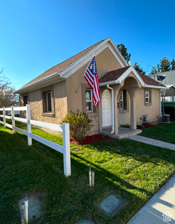 Ranch-style house with stucco siding
