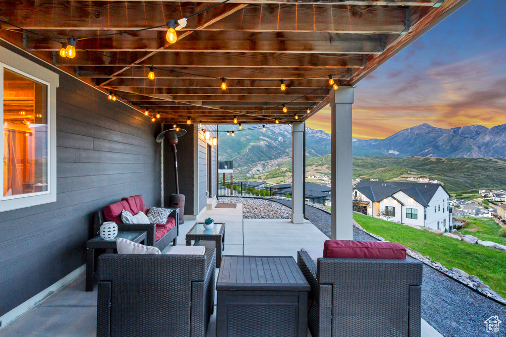 View of patio / terrace with a mountain view and an outdoor hangout area