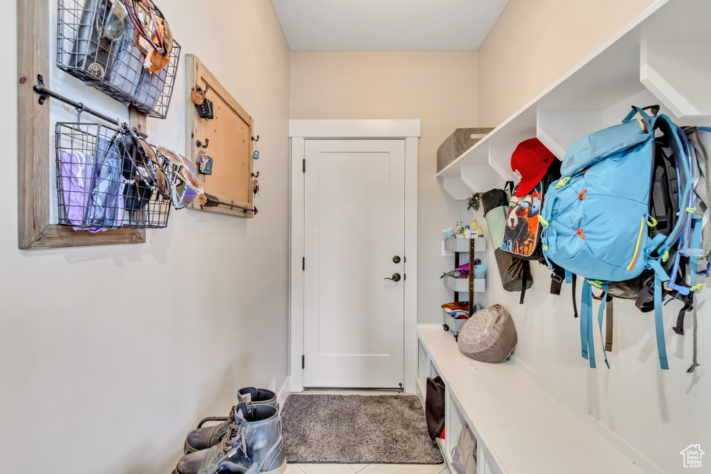 Mudroom featuring tile patterned floors