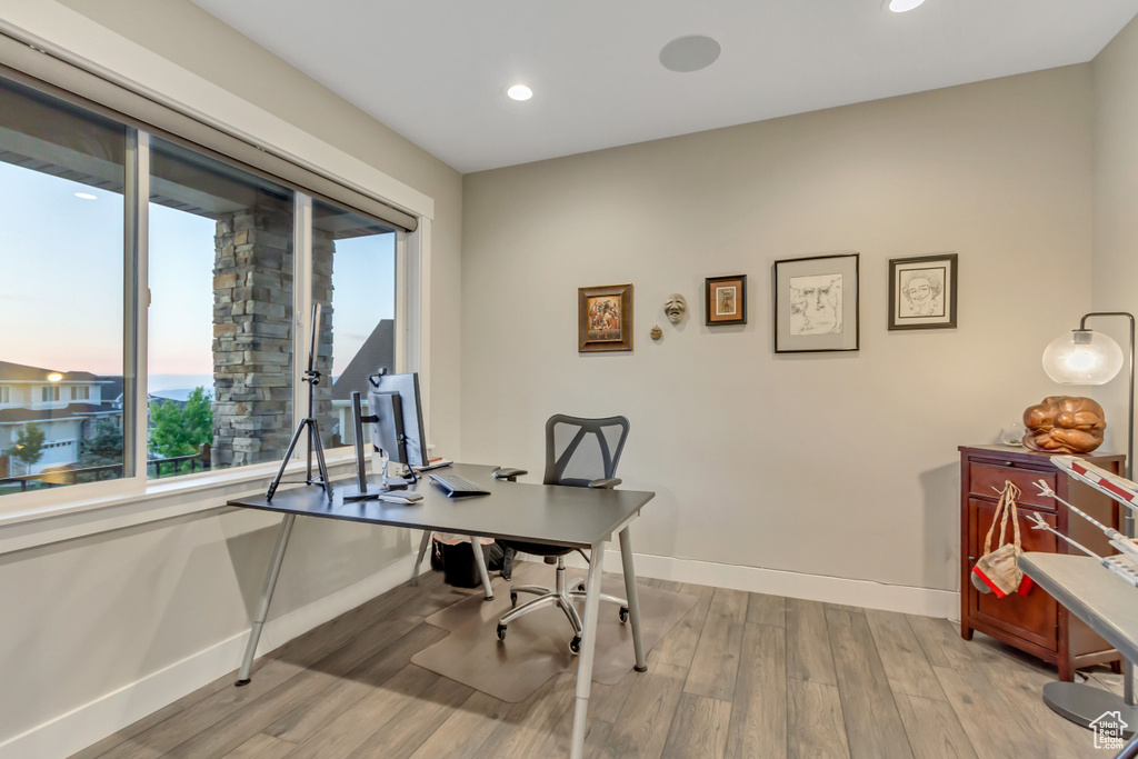 Home office featuring baseboards, wood finished floors, and recessed lighting