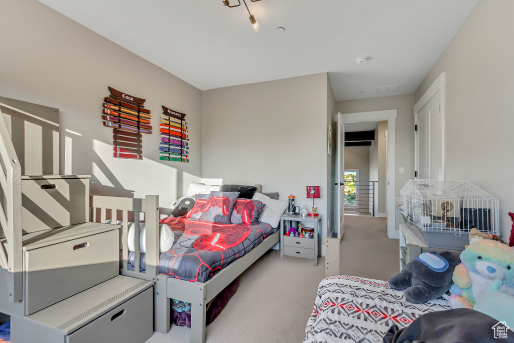 Bedroom with carpet