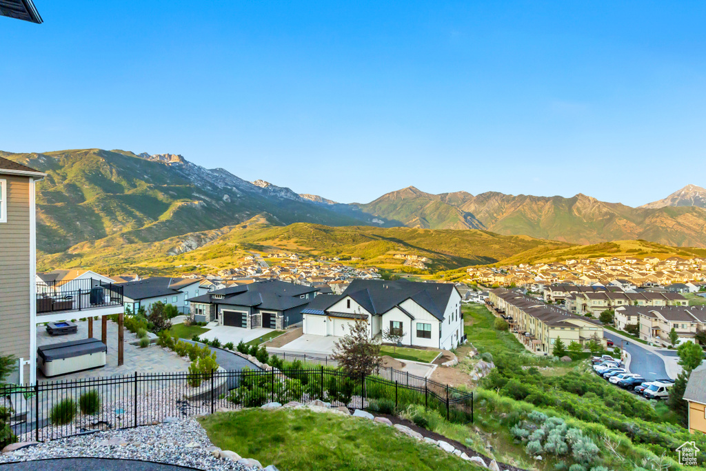 View of mountain background featuring nearby suburban area