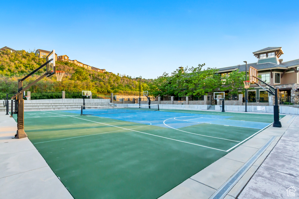 View of sport court featuring community basketball court and a tennis court