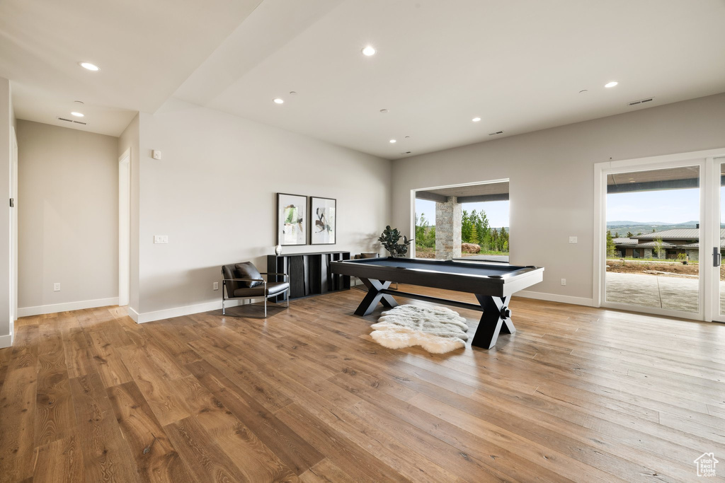 Playroom featuring billiards, wood finished floors, recessed lighting, and baseboards