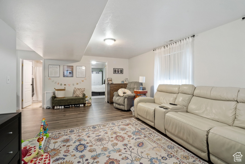 Living room featuring wood finished floors