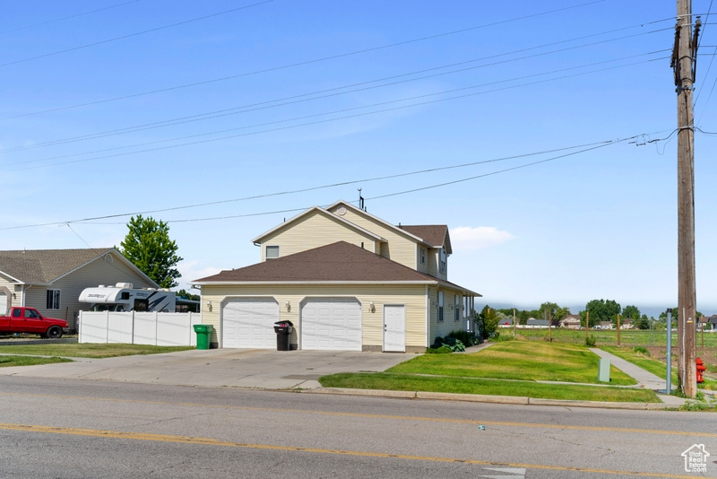 Garage featuring driveway
