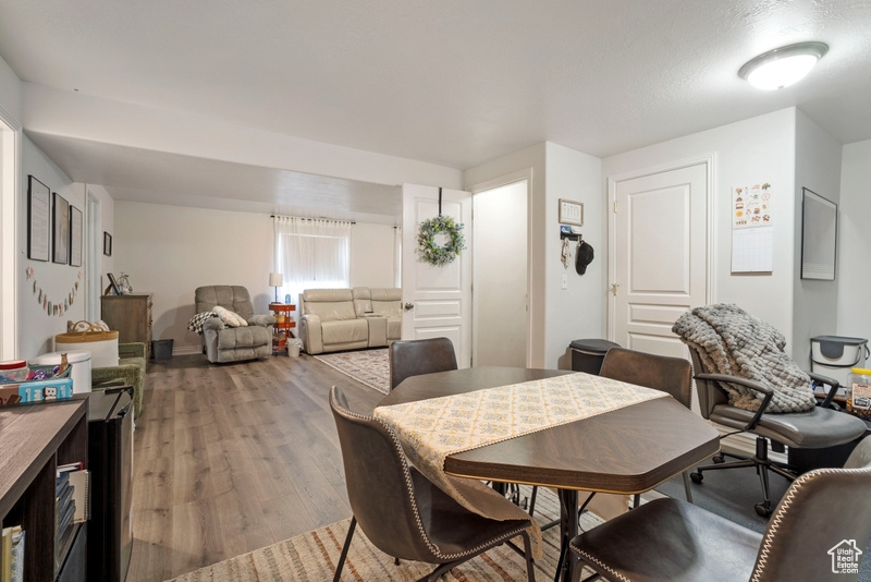 Dining area with wood finished floors