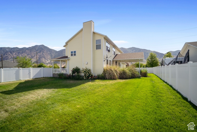 View of yard featuring a mountain view