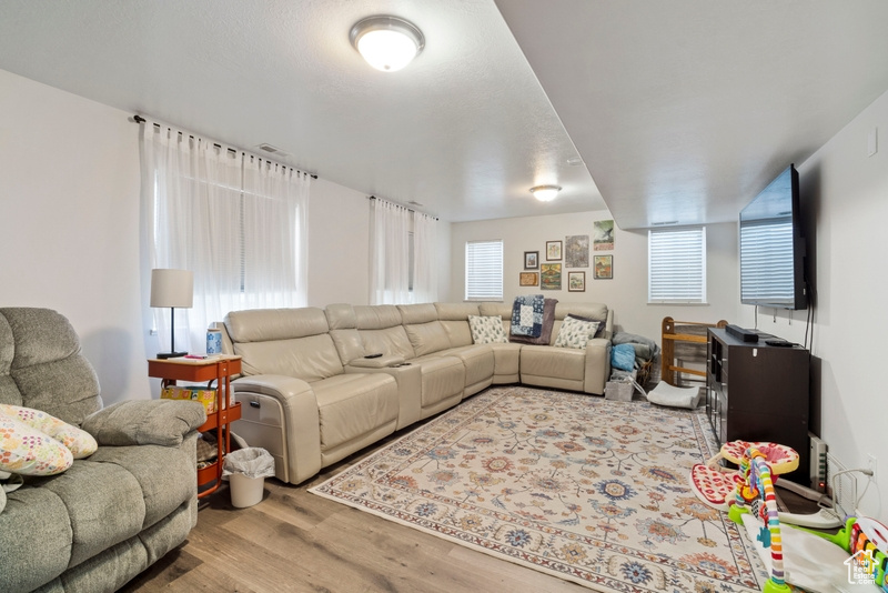 Living area featuring wood finished floors