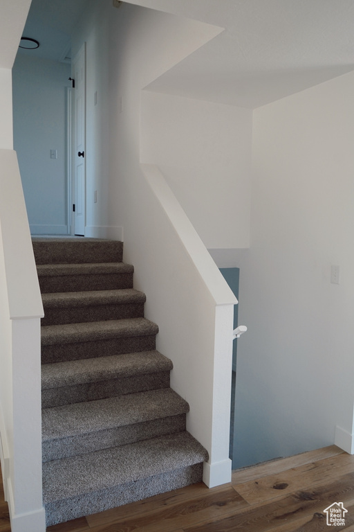 Stairs with wood finished floors