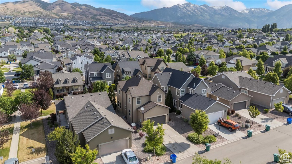 Aerial view of residential area with a mountain backdrop