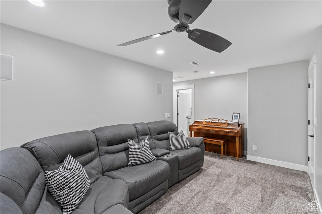 Living area featuring ceiling fan, recessed lighting, carpet floors, and baseboards