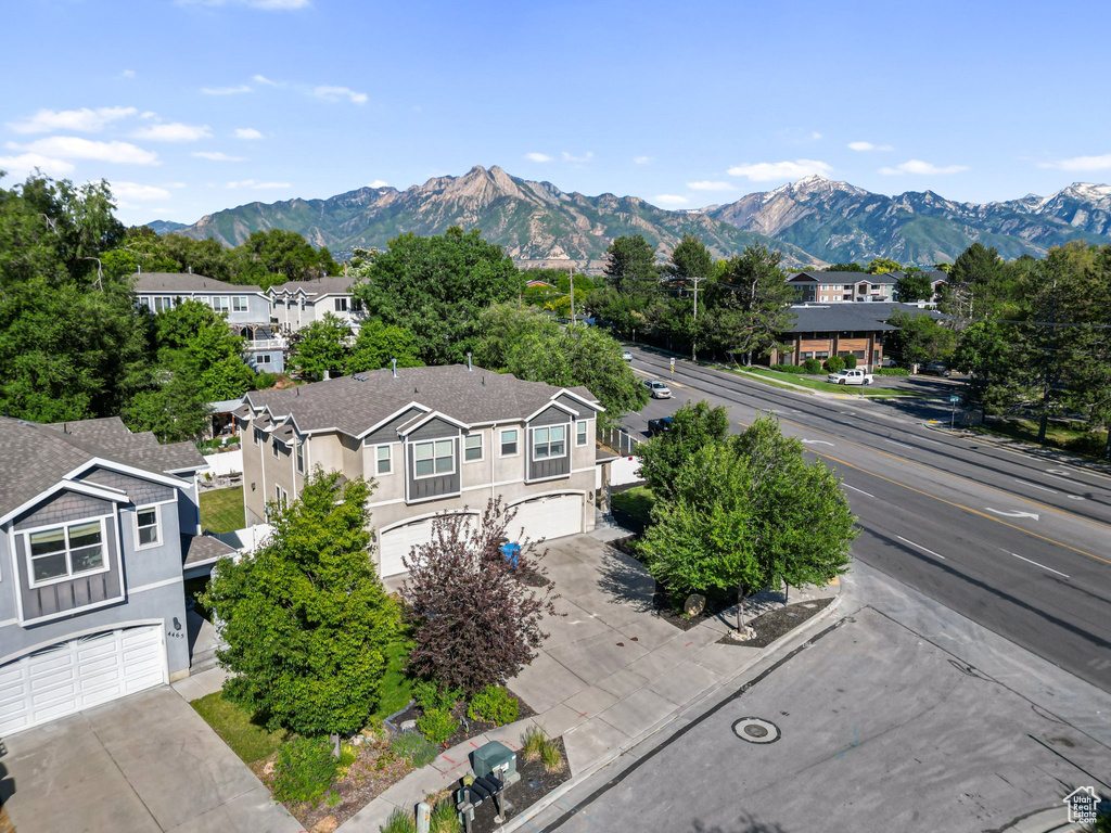 View of mountain background featuring nearby suburban area