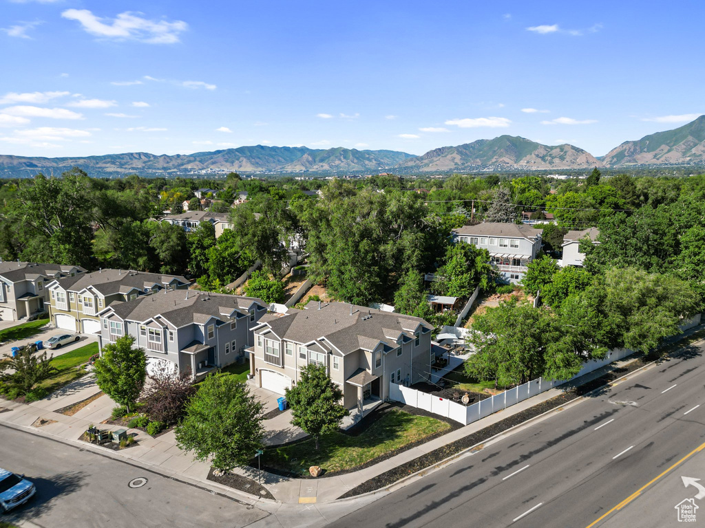 Aerial view of residential area with a mountain backdrop