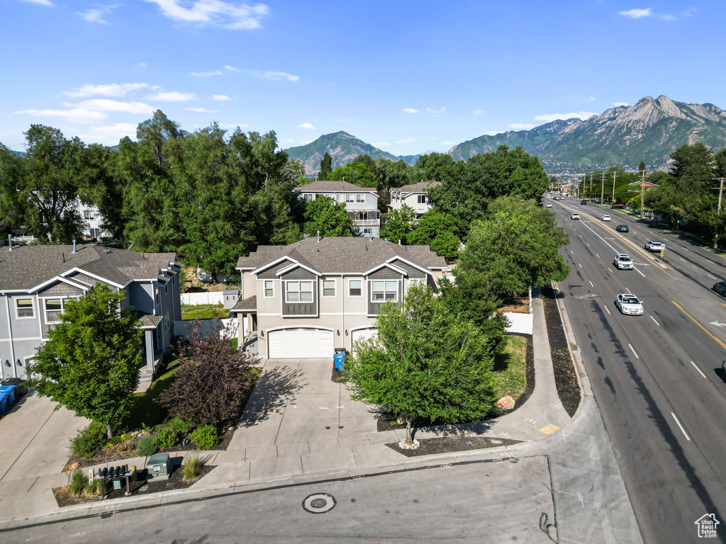Aerial view of residential area featuring mountains