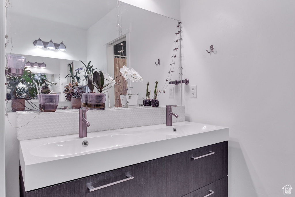Bathroom featuring double vanity