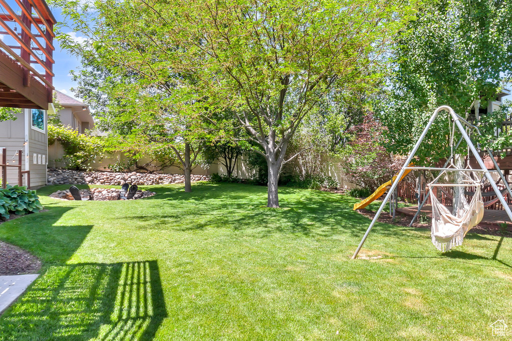 View of yard with a playground
