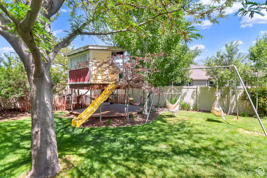 View of yard featuring a deck