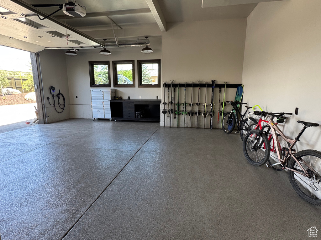 Garage featuring a garage door opener