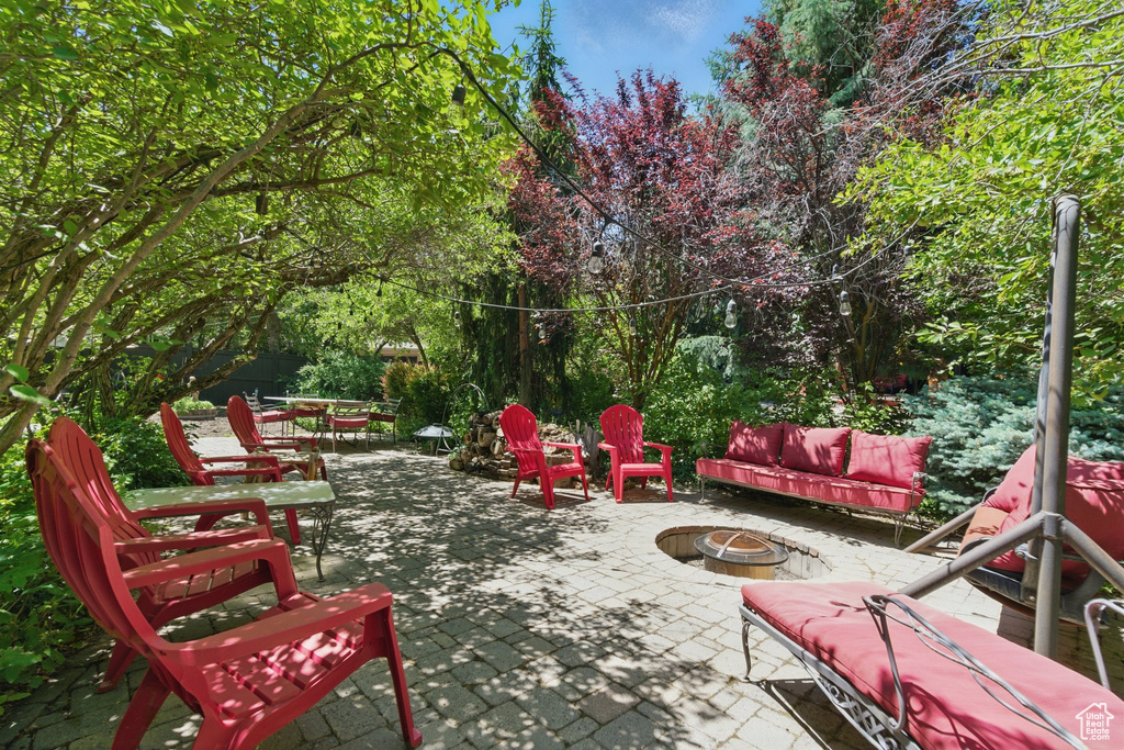 View of patio / terrace with a fire pit