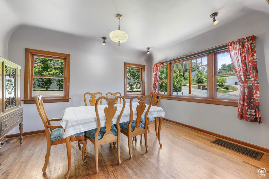 Dining area featuring baseboards and light wood-style floors