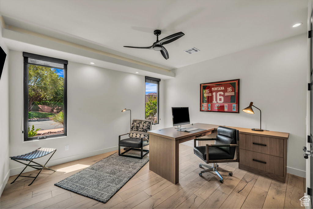 Office featuring a ceiling fan, baseboards, light wood-type flooring, and recessed lighting