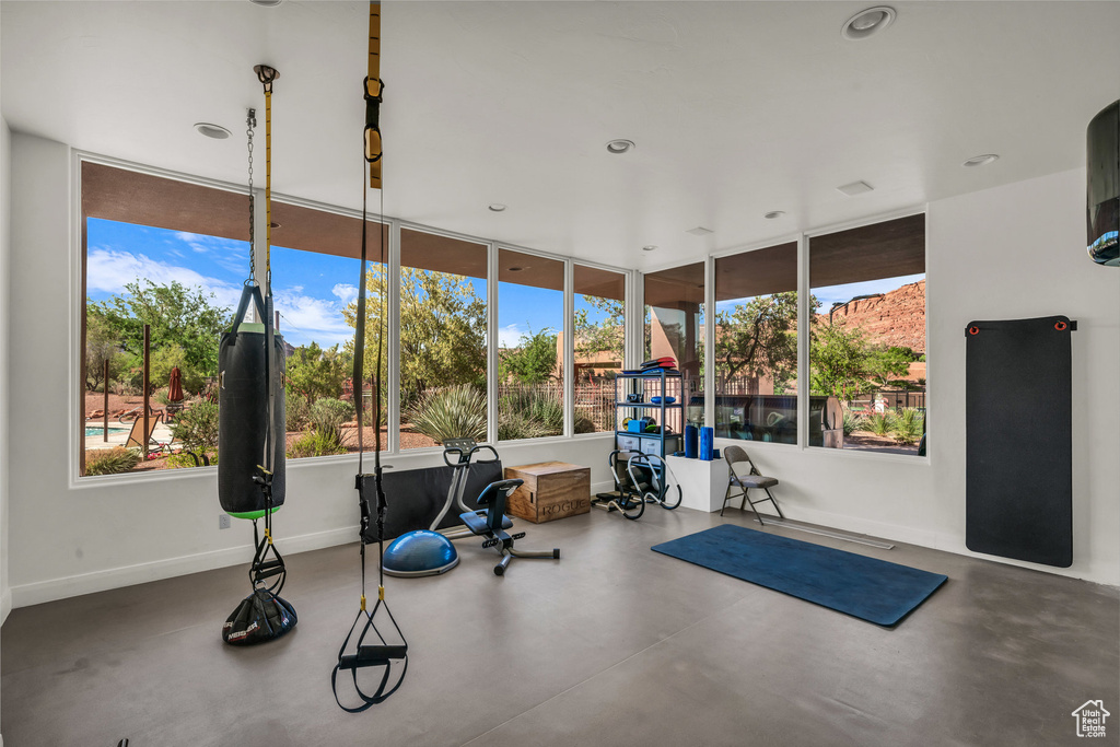 Workout area featuring recessed lighting and baseboards
