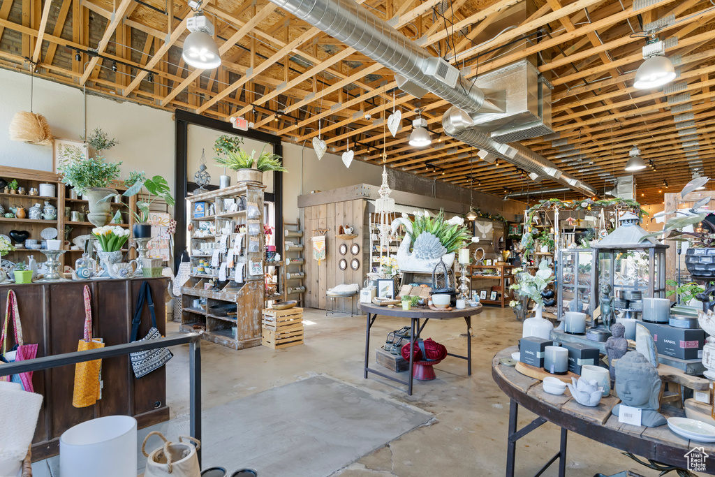 Miscellaneous room featuring unfinished concrete floors